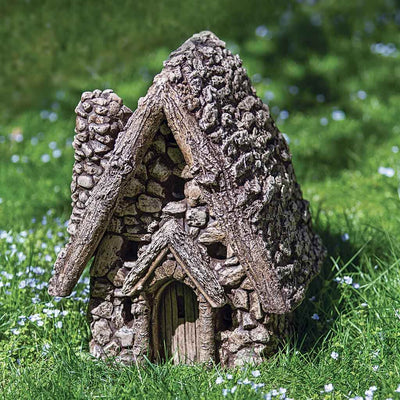 Campania International Gnome Sweet Home Statue stained in the Brownstone patina, the ideal color for this garden statue.