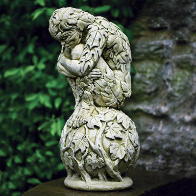 Campania International Awakening Statue, set in the garden to add charm and character. The statue is shown in the English Moss Patina.