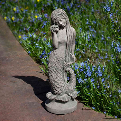 Campania International Standing Mermaid Statue stained in the Alpine Stone patina, the ideal color for this garden statue.
